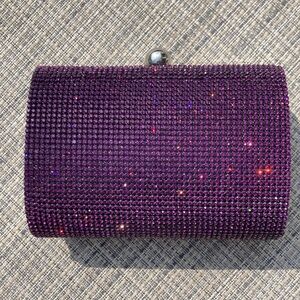 Purple rhinestone and satin clutch